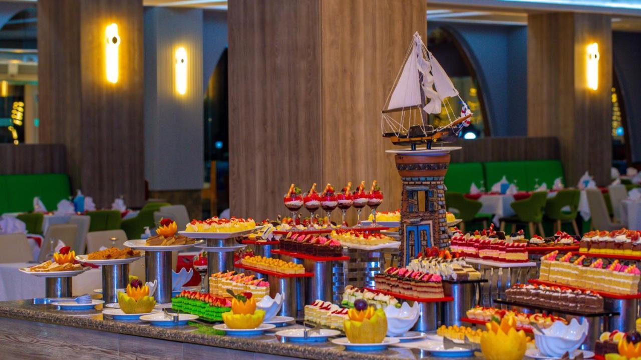 Titanic Beach - Families And Couples Only Hurghada Exterior photo A dessert buffet