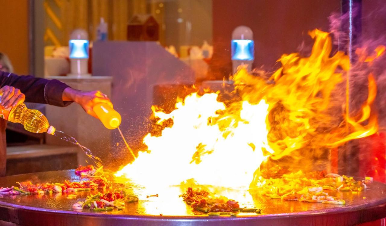 Titanic Beach - Families And Couples Only Hurghada Exterior photo Flaming food